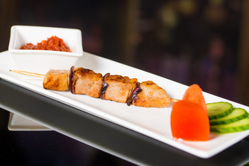 Grilled skewers with vegetables and sauce