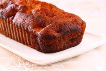 homemade apple cake over wooden table  