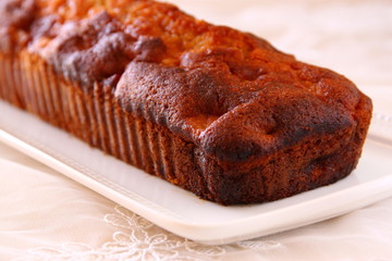 homemade apple cake over wooden table  