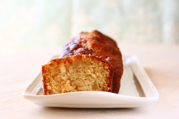 homemade apple cake over wooden table  