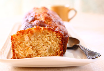 homemade apple cake over wooden table  