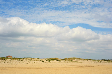 Fototapeta na wymiar Spanish landscape with sand and sky with clouds