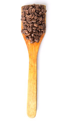 Roasted coffee beans on wooden spatula