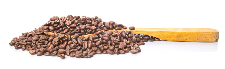 Roasted coffee beans on wooden spatula