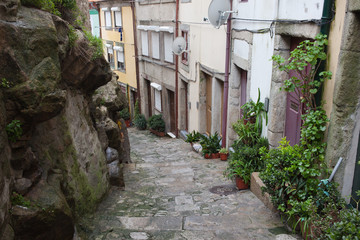 Fototapeta na wymiar Houses Along Alley In The Old Town Of Porto
