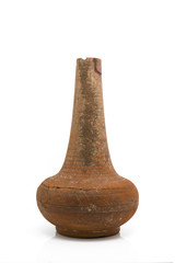 Antique clay jug isolated on white background