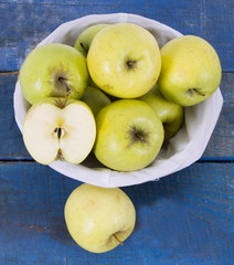 apples on blue background