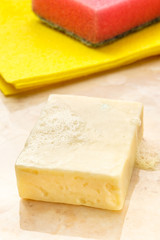 Bar of soap, duster and sponge