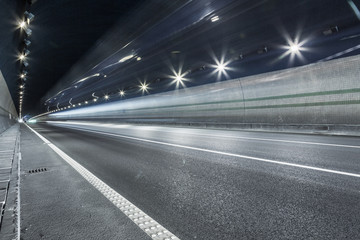 Fototapeta na wymiar speeding car through tunnel
