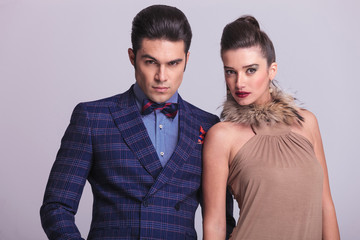Young fashion couple posing together
