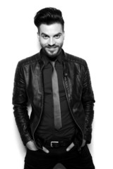 Smiling young business man posing