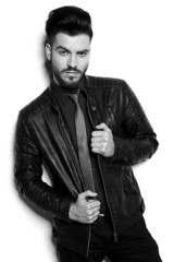 young business man pulling his jacket