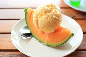 Vanilla Icecream with melon piece summer dessert