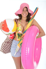 Young Woman Wearing a Swim Suit on Holiday Carrying a Beach Ball