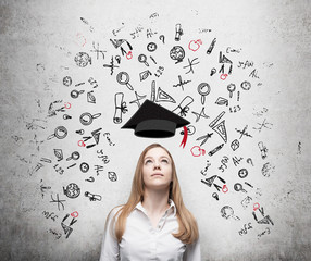 Young beautiful business woman is thinking