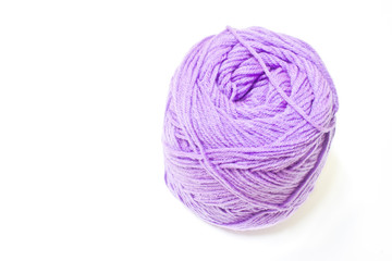 Violet yarn on white background