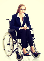 Smiling businesswoman on a wheelchair