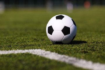 Fototapeta na wymiar Green pitch with soccer ball