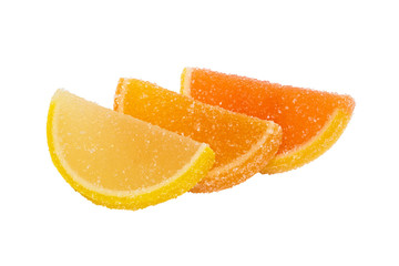 Three slices of  marmalade lying one on another, on a white back