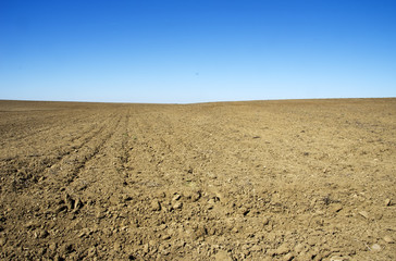 plowed field in  rural landscape