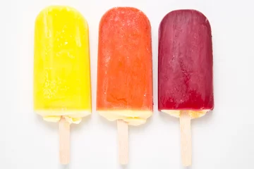 Selbstklebende Fototapete Süßigkeiten Colorful fruity ice cream isolated on white background