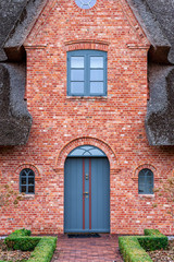 Fototapeta na wymiar House entrance with blue door