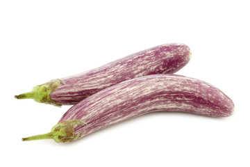 two striped aubergines on a white background