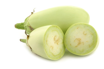 light green zucchini's (Cucurbita pepo) on a white background