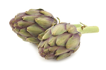 Obraz premium two freshly cut artichoke halves on a white background