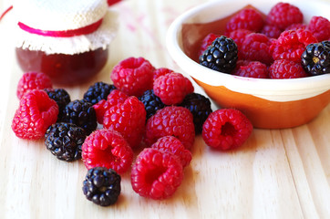 blackberry and raspberry on table