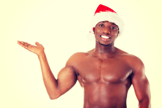 Black Man Wearing Chrismtas Hat