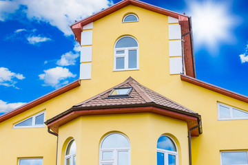 house with a gable roof window