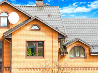 house with a gable roof window