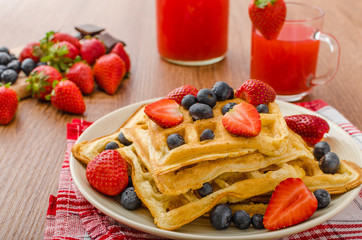 Belgian waffles with blueberries, strawberries