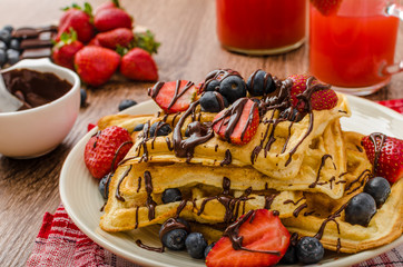 Belgian waffles with blueberries, strawberries