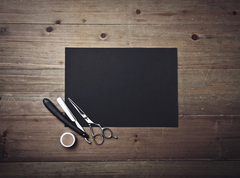 Old style barber tools and black poster