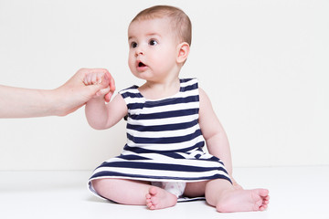 Fototapeta premium Beautiful smiling cute baby girl
