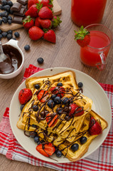 Belgian waffles with blueberries, strawberries