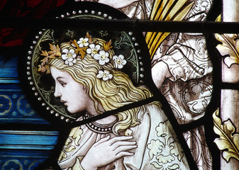Obraz premium Girl with flowers in her hair (stained glass)