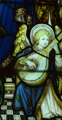 Angel playing a music instrument