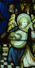 Obraz premium Angel playing a music instrument