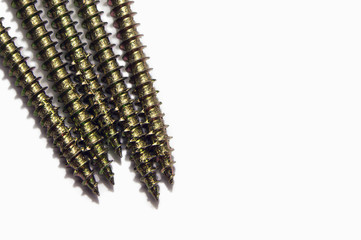 Row of metal screws, isolated on white