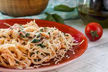 Pasta with fish and creamy spinach sauce