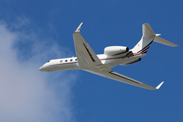 Private corporate business jet in flight