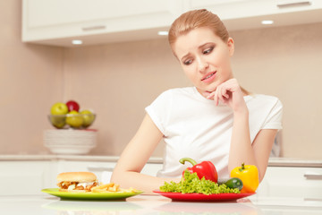 Young woman choosing lunch