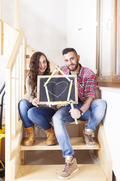 young couple moves into new home