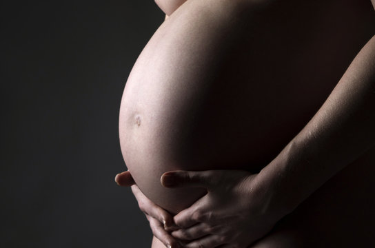 Close up of belly of pregnant woman