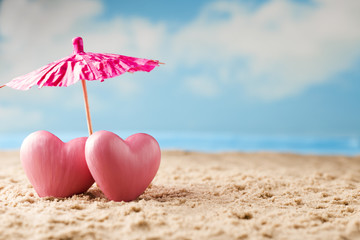 Heart on the sand on the seashore.