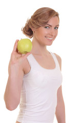 young fitness woman happy smiling holding apple