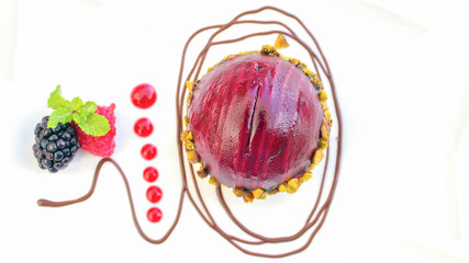 blueberry mousse cheese cake on white plate